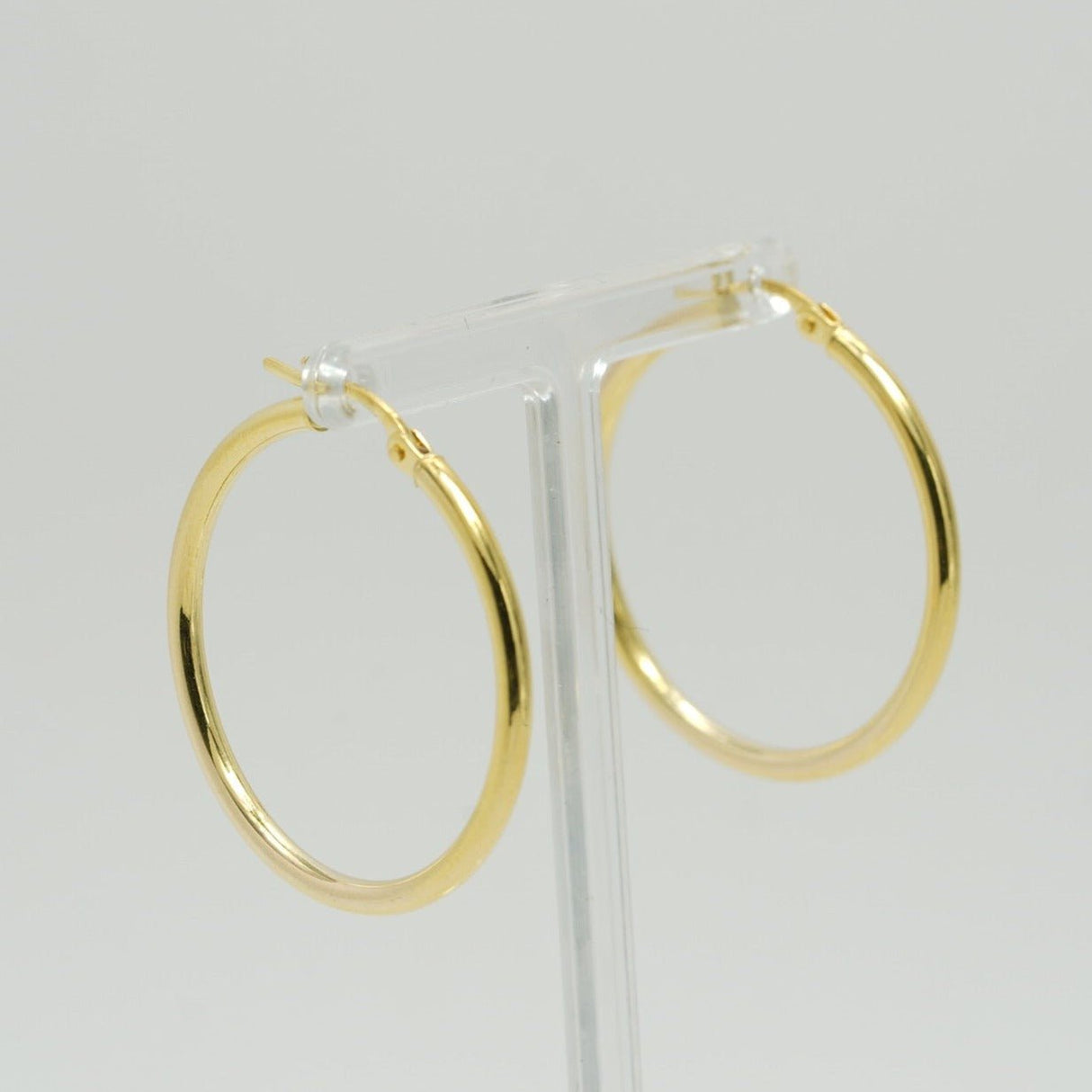 14K Gold Hoop Earrings, light gold hoop earrings, Diamond Origin,Choose our gold hoop earrings and experience the perfect blend of quality, style, and versatility. Whether you're treating yourself or looking for the perfect gift for someone special, these earrings are sure to make a lasting impression. 