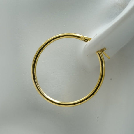 14K Gold Hoop Earrings, light gold hoop earrings, Diamond Origin, Looking for the perfect pair of hoop earrings to add to your collection? Look no further than our stunning gold hoop earrings! Crafted from high-quality materials and designed to elevate any outfit, these hoops are the ultimate accessory for any fashion-forward woman.