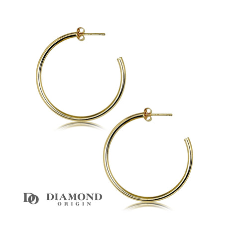 Our 14K Gold Hoop Earrings are the perfect blend of classic and modern. Crafted with high-quality, durable 14K gold and a 30 mm large circle, they are sure to add an elegant touch of style to your look.