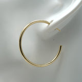 Looking for the perfect pair of hoop earrings to add to your collection? Look no further than our stunning gold hoop earrings! Crafted from high-quality materials and designed to elevate any outfit, these hoops are the ultimate accessory for any fashion-forward woman.