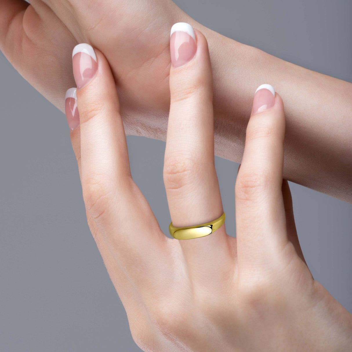 This ring features an elongated oval signet, a design element that harkens back to ancient times when signet rings were used as personal signatures. The sleek, elongated design adds a contemporary feel to the piece, making it a versatile accessory that can be dressed up or down, gold stackable ring, solid gold rings, 14K gold rings, diamond origin,