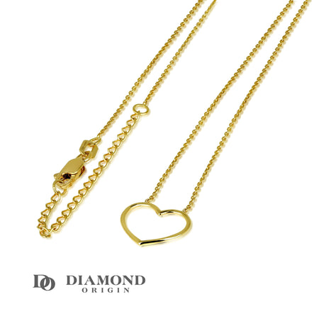The 14K gold necklace presented is a delicate testament to love and elegance. Its design, dominated by an open wire heart, speaks to the vulnerability and transparency of true emotions.