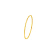 A 14K Gold Stackable Wire Ring shimmering in the soft light, exuding both minimalistic charm and timeless elegance,gold ring, gold rings, gold band, gold bands, stackable band, diamond origin,