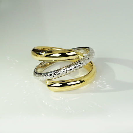 This 14K Two-Tone Gold Bypass Fashion Ring 2023 features a unique bypass design in two different shades of gold. The contrast and visual depth make this piece an intriguing accessory for the fashion-conscious individual, gold ring, gold rings, 14K gold rings, 14K gold ring, stackable gold rings, fashion gold rings,