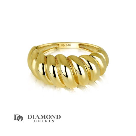 This exquisite Twisted Dome Ring from Diamond Origin perfectly captures the essence of timeless elegance and modern design. Crafted from the finest gold, the ring boasts a unique twisted dome shape that makes a bold yet refined statement. diamond origin, stackable rings, gold rings, 14K gold rings,